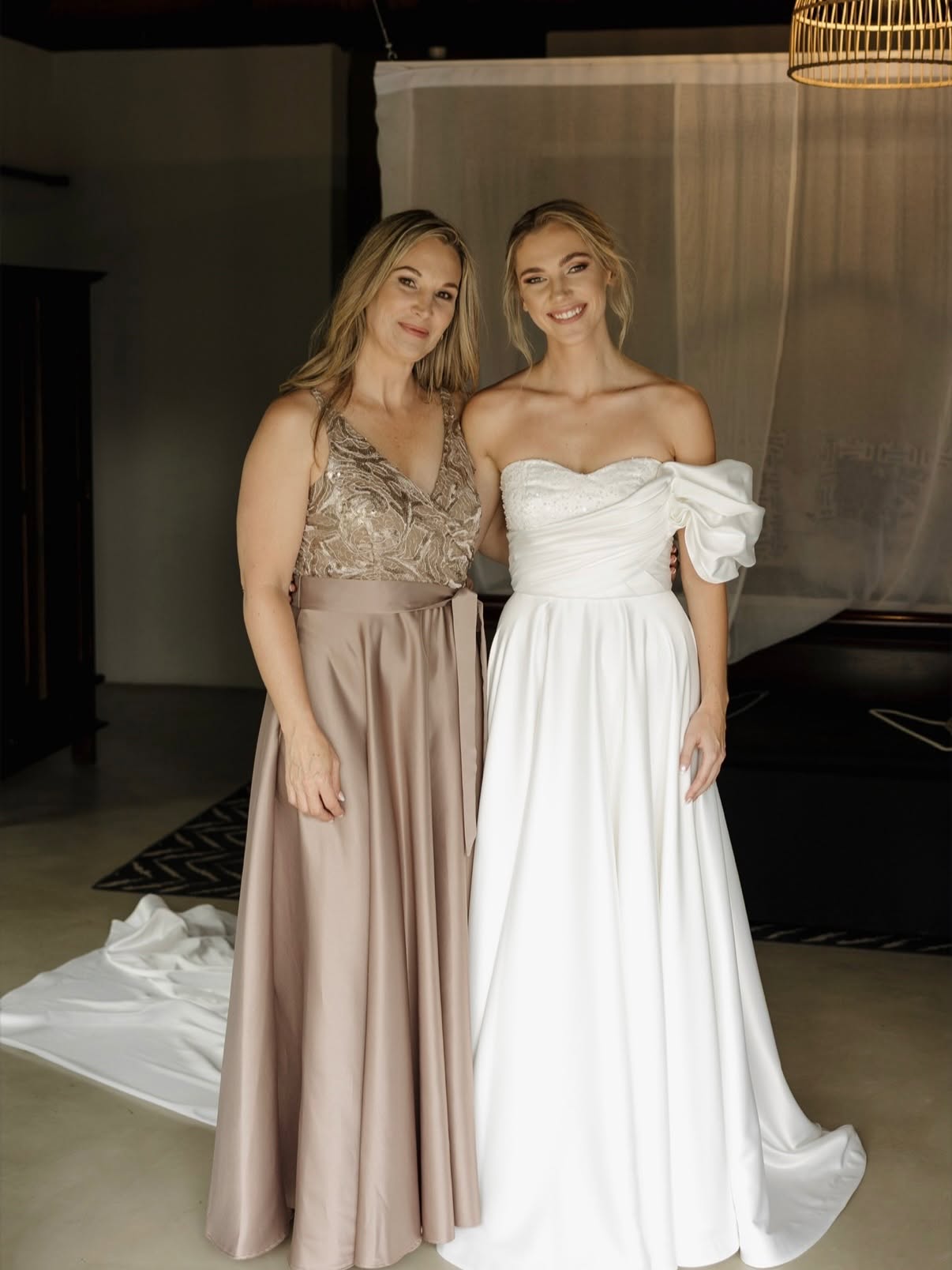 Custom hand-crafted bridal wedding gown with intricate seam detail and train